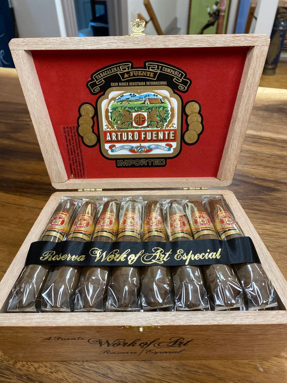 Cigar and whiskey on a wooden table