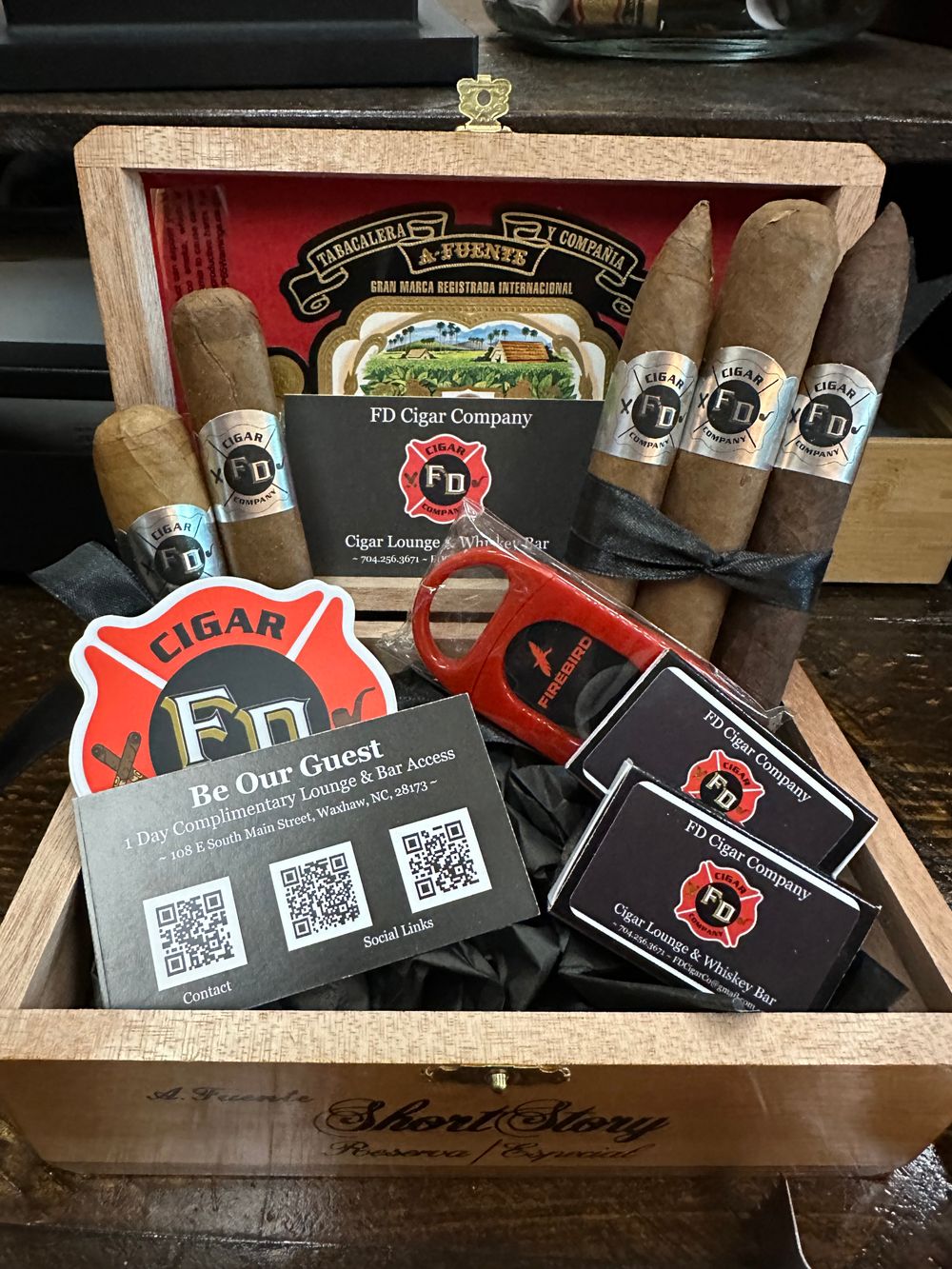 Cigar and whiskey on a wooden table