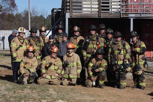 Firefighters enjoying cigars