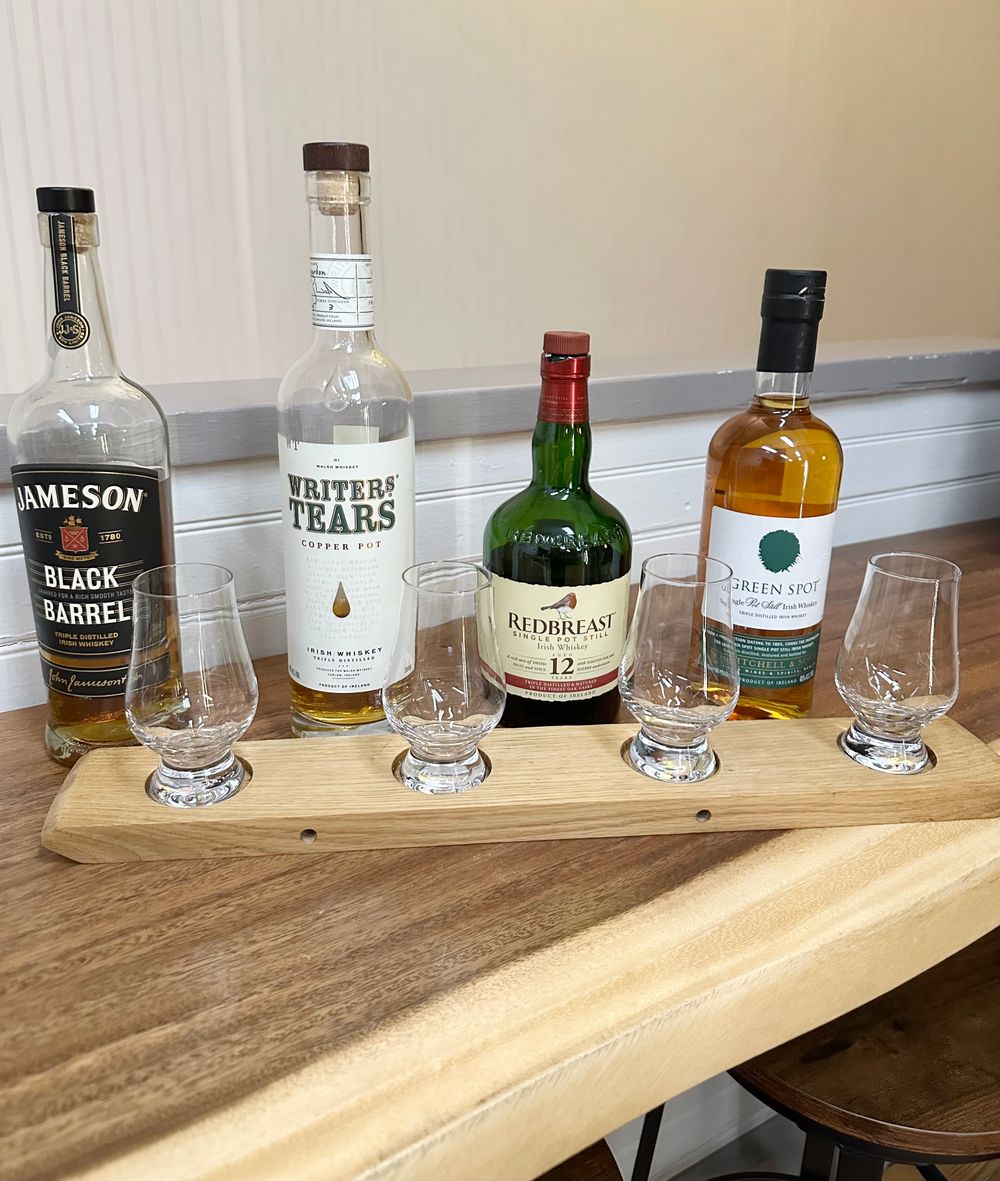 Cigar and whiskey on a wooden table